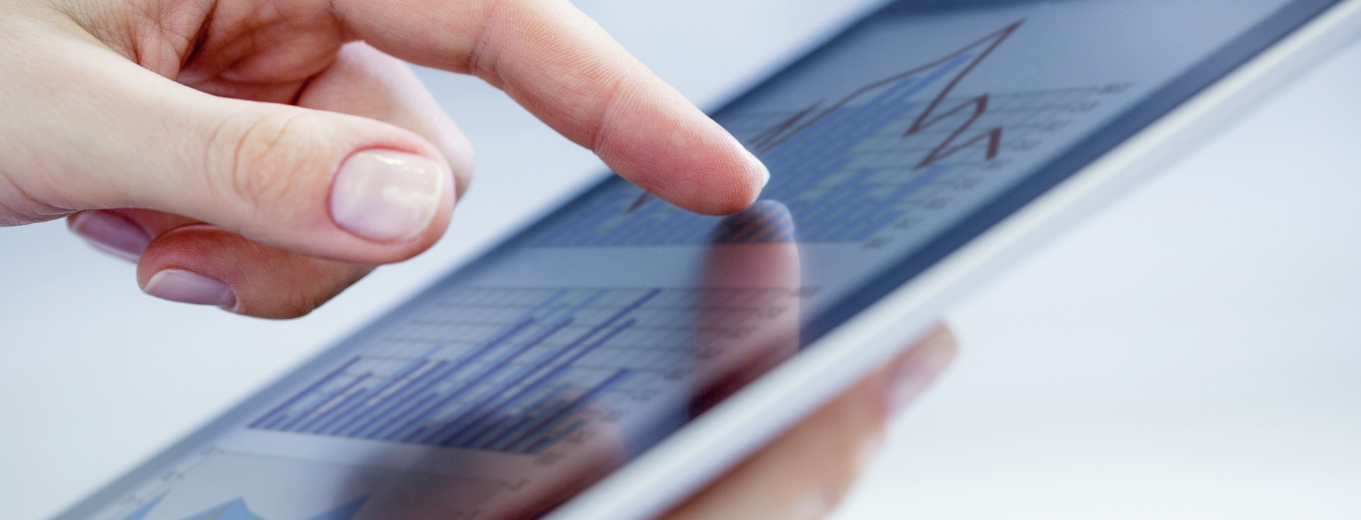 finger tapping on the touchscreen of a tablet finger tapping on the touchscreen of a tablet
