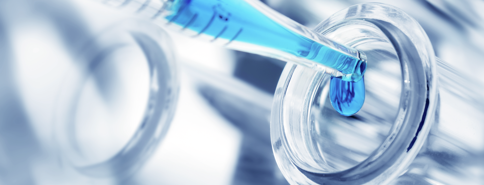 blue liquid is pipetted into a sample vessel blue liquid is pipetted into a sample vessel