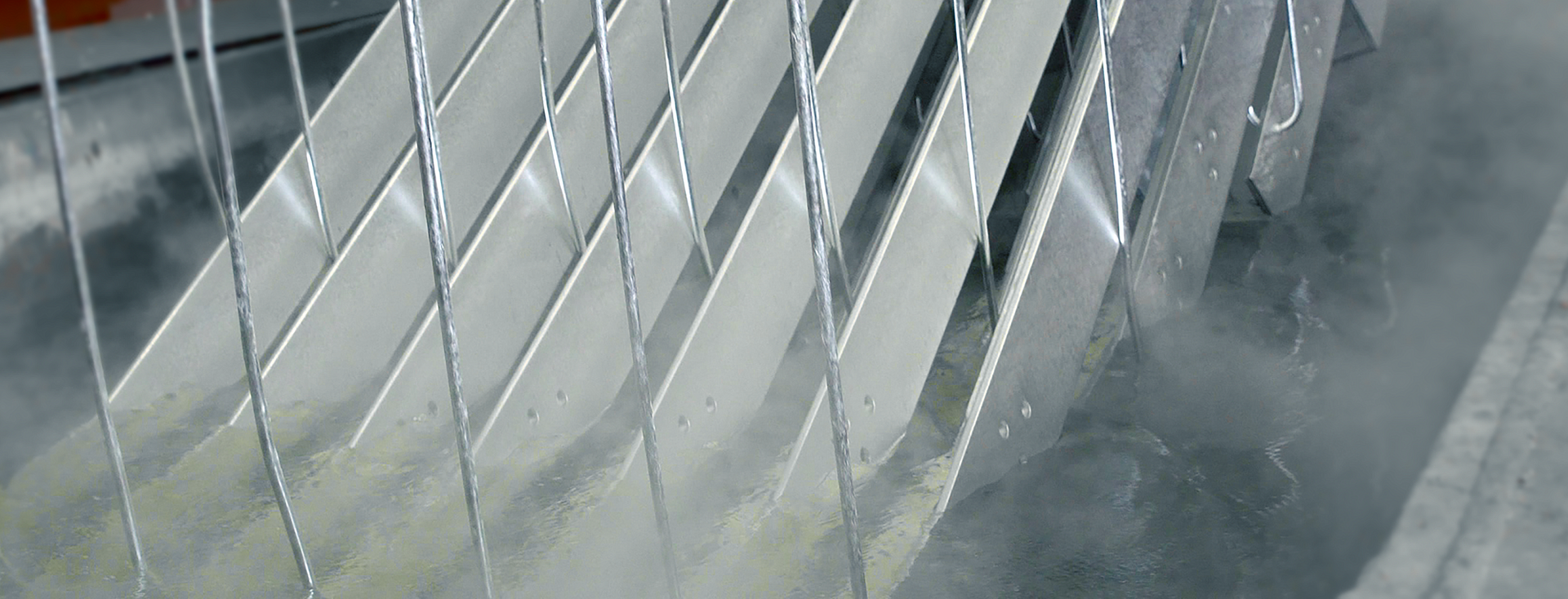 metal plates are immersed in a cleaning bath metal plates are immersed in a cleaning bath